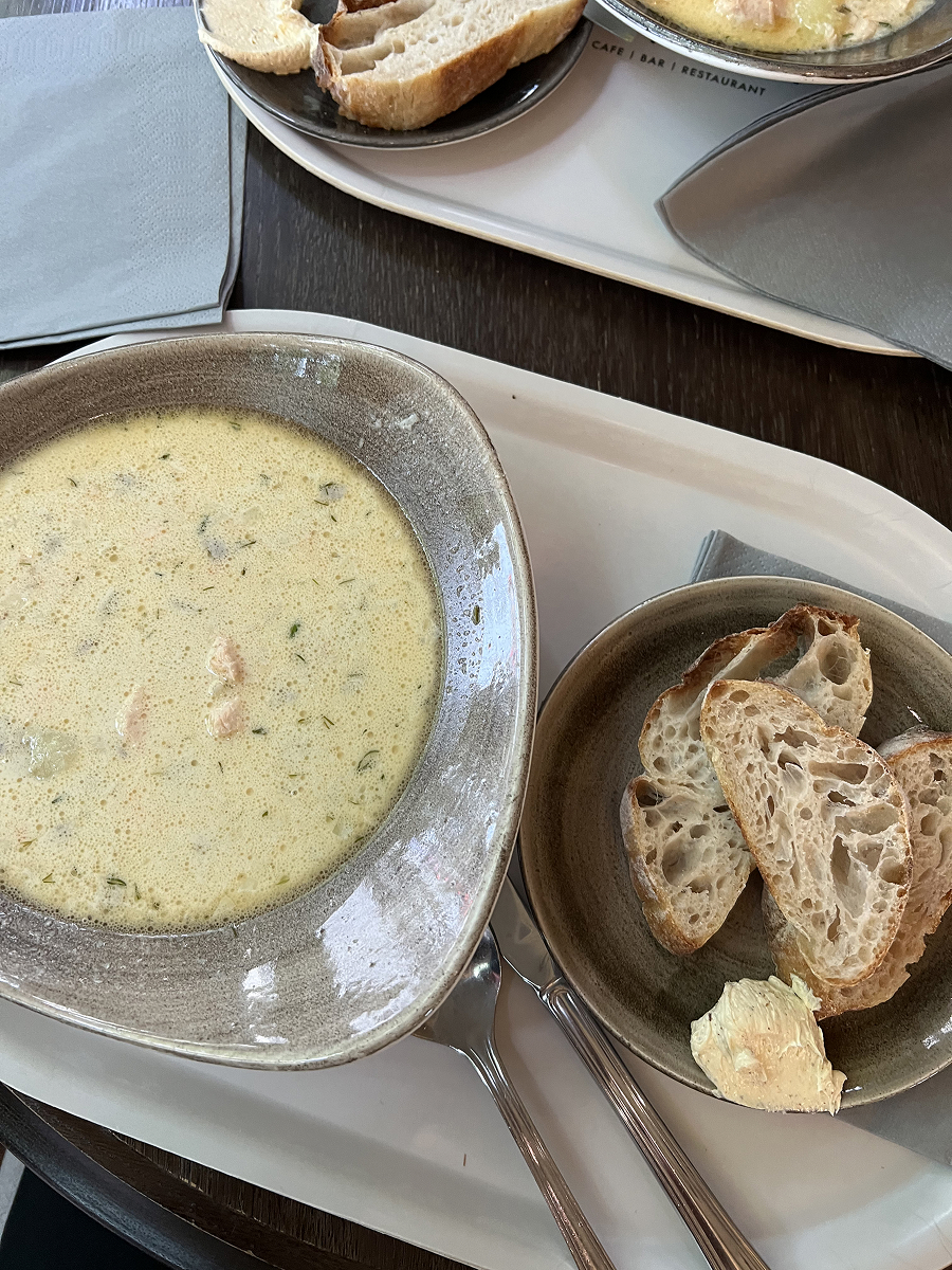 Creamy salmon soup with bread at Kappeli restaurant in Helsinki, Finland.