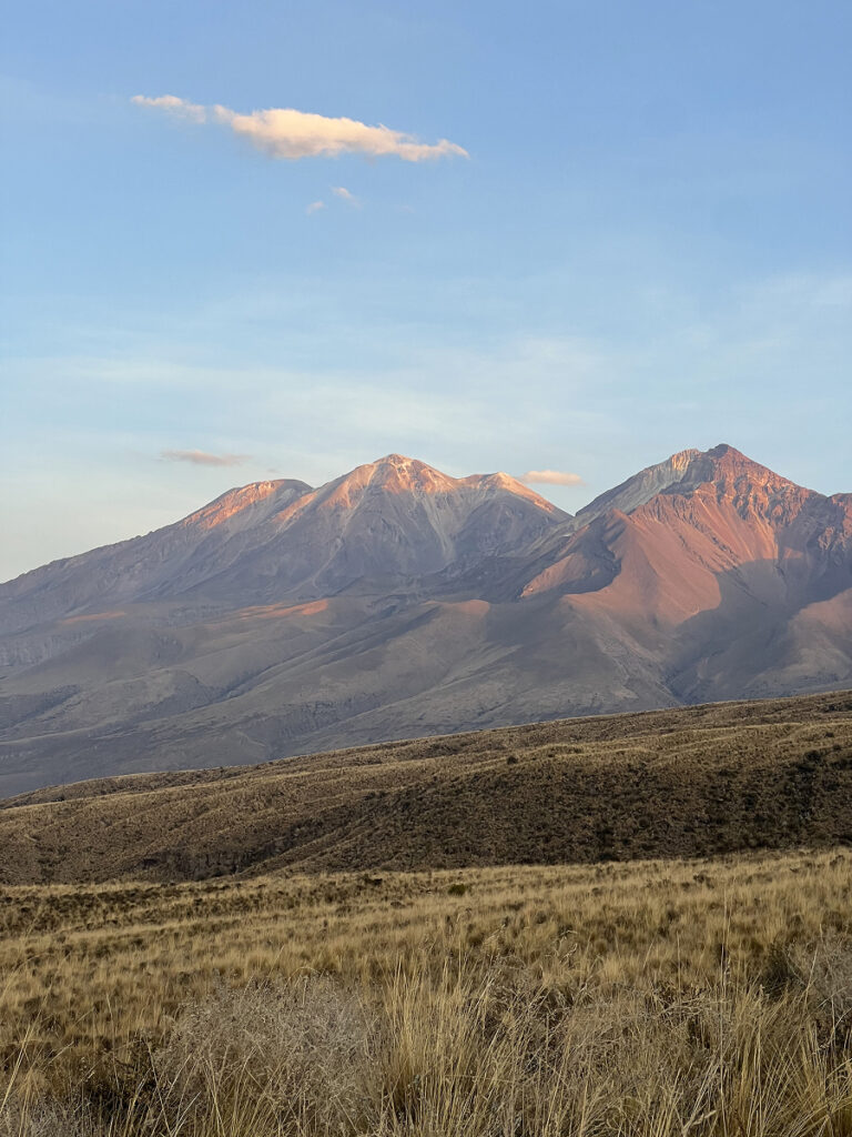 Sunrise view of volcanic peaks near El Misti during the climb in Arequipa, Peru