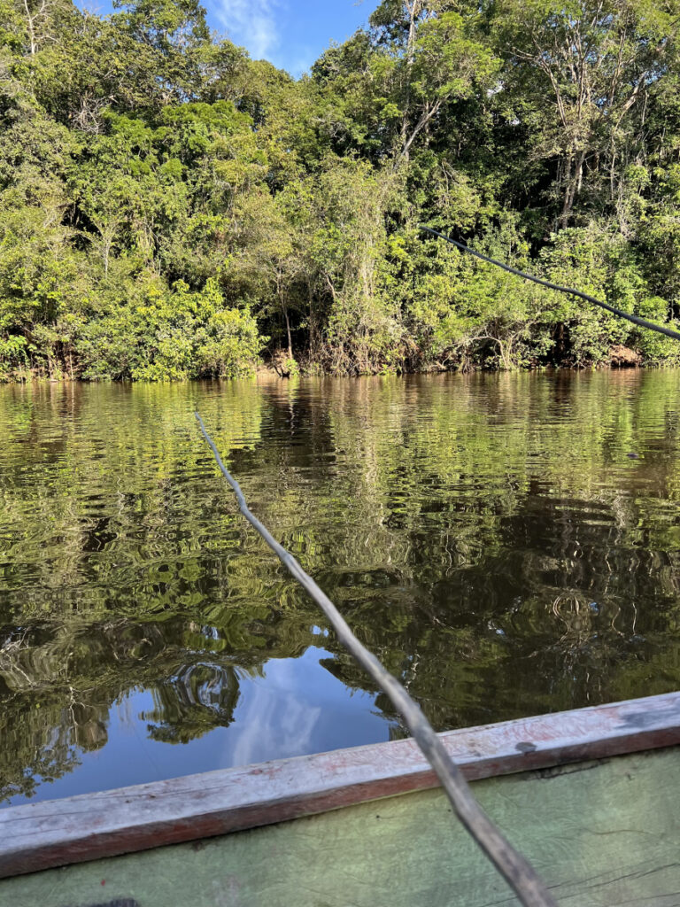 Fishing from a wooden boat on the Amazon River near Nauta, Peru