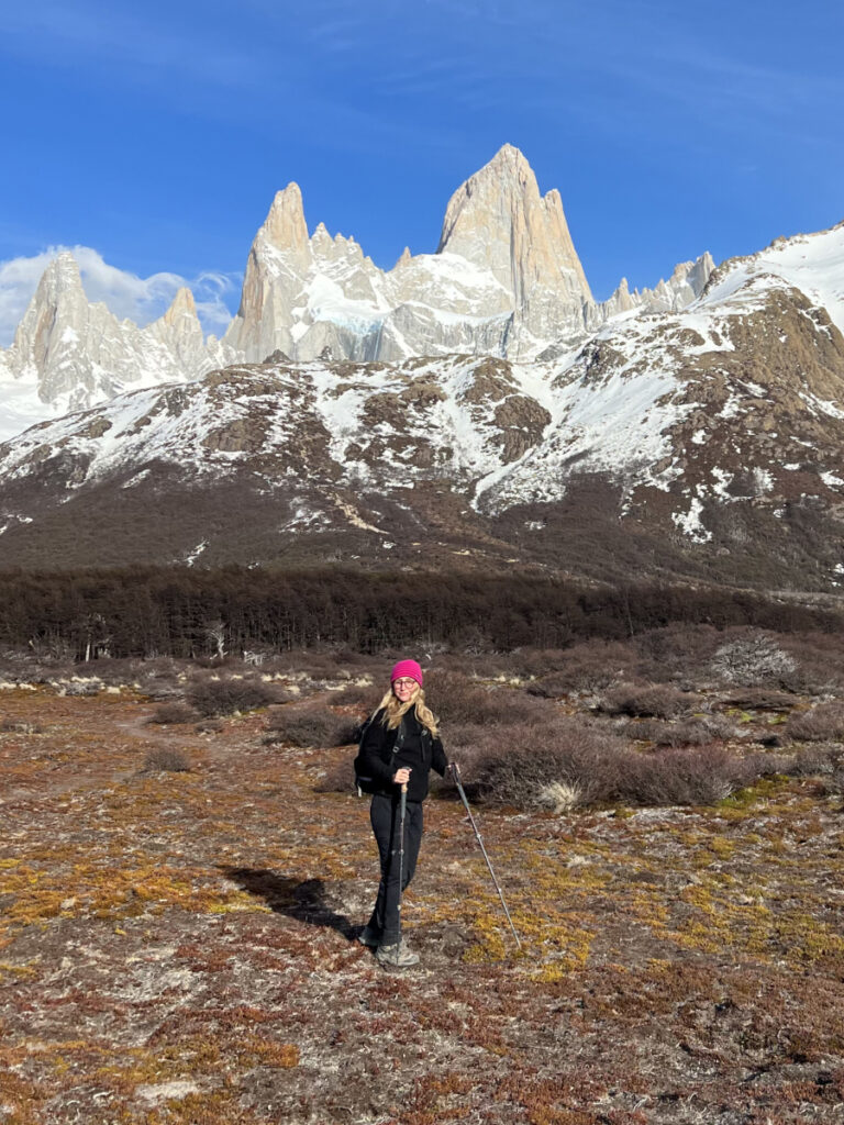 Hiker on the trail with Mount Fitz Roy in the background near El Chaltén, Patagonia Argentina.