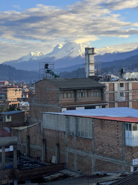 View of Huascarán at sunrise from our Airbnb rooftop in Huaraz, Peru